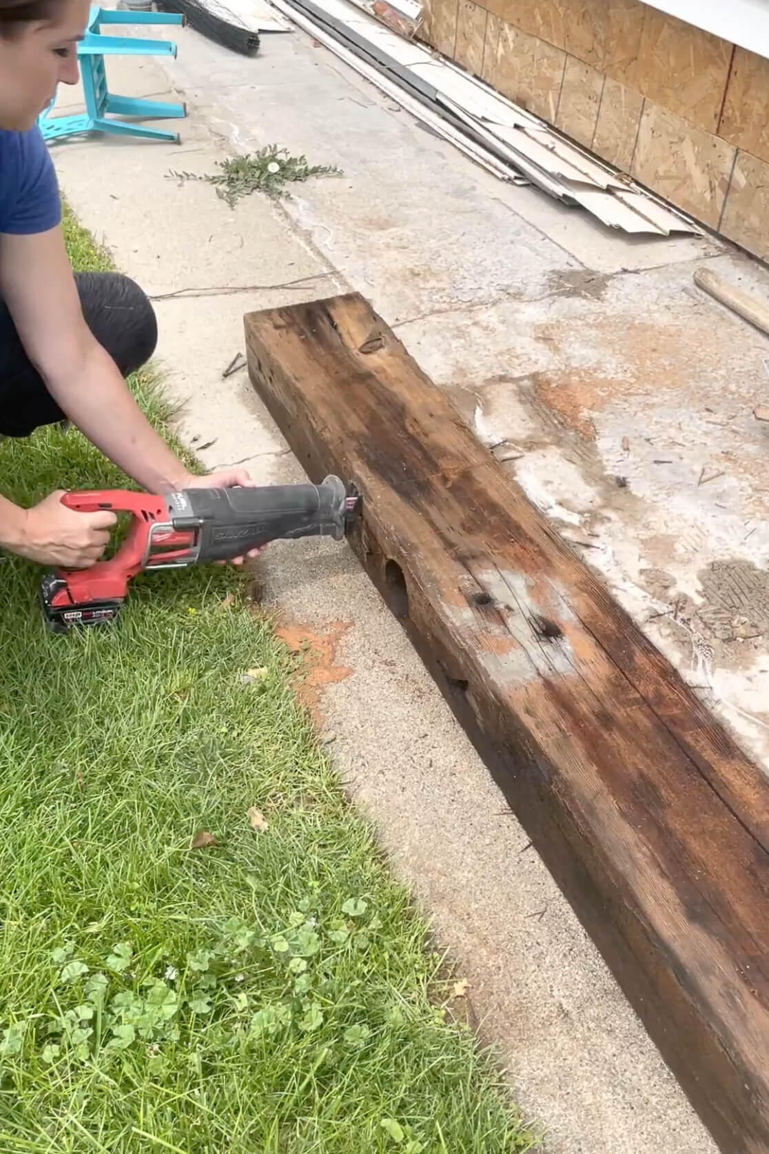 Cutting an old mantle to make it shorter.